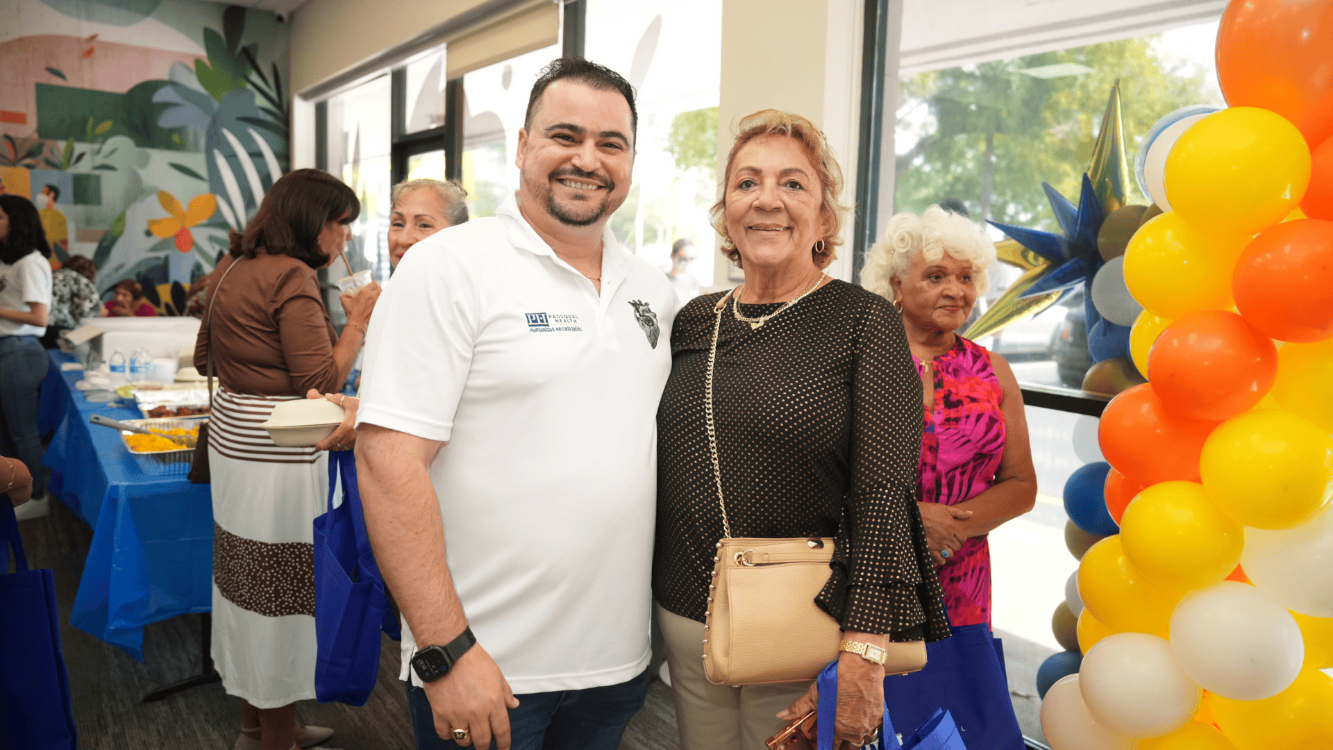 PassQual Health staff member with a senior patient at the primary care clinic in Miami Gardens, Florida