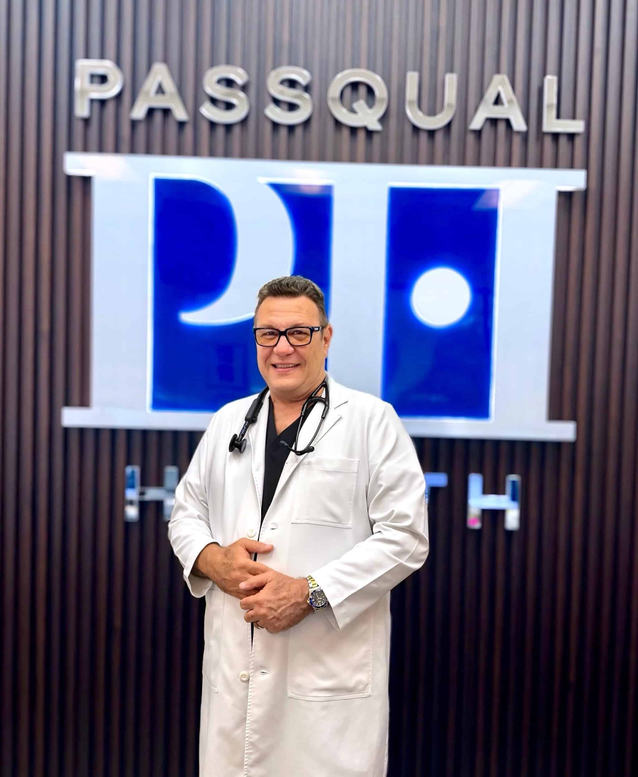 Portrait of Gonzalo Portal Lemock, APRN, Primary Care Provider at PassQual Health, wearing a white coat