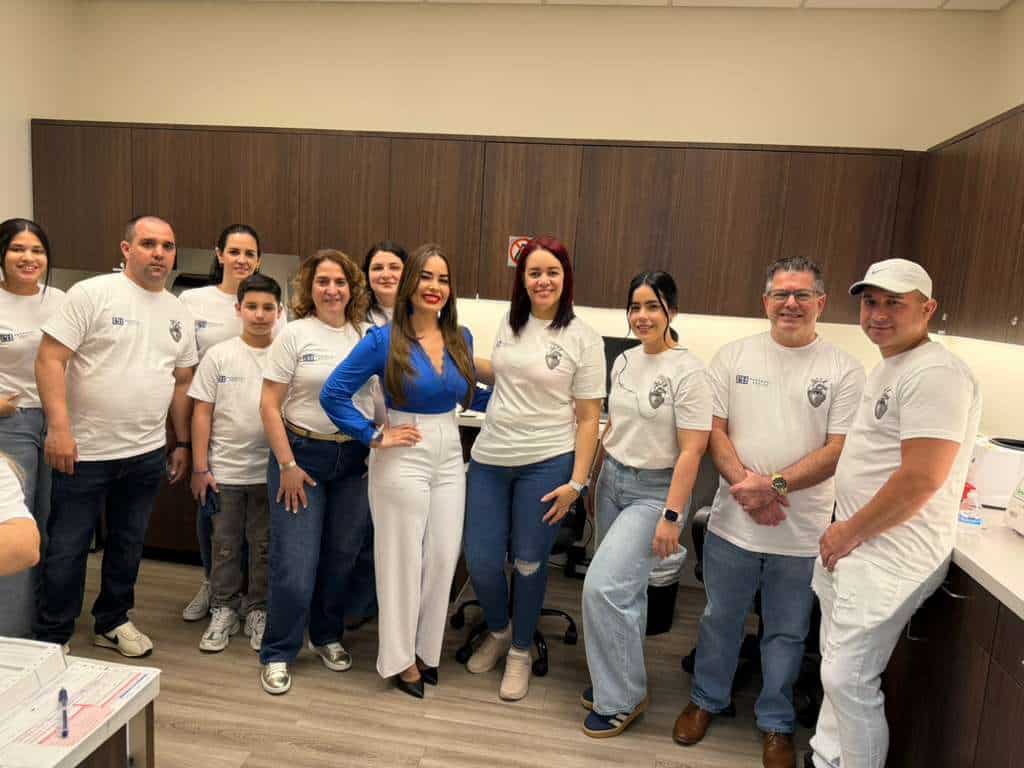 Group of healthcare professionals at PassQual Health clinic.