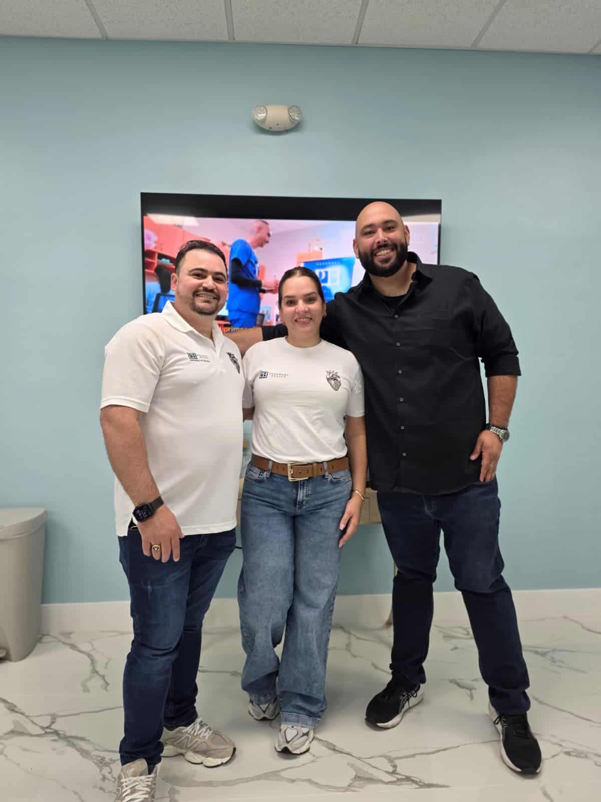 PassQual Health medical team smiling in clinic setting.